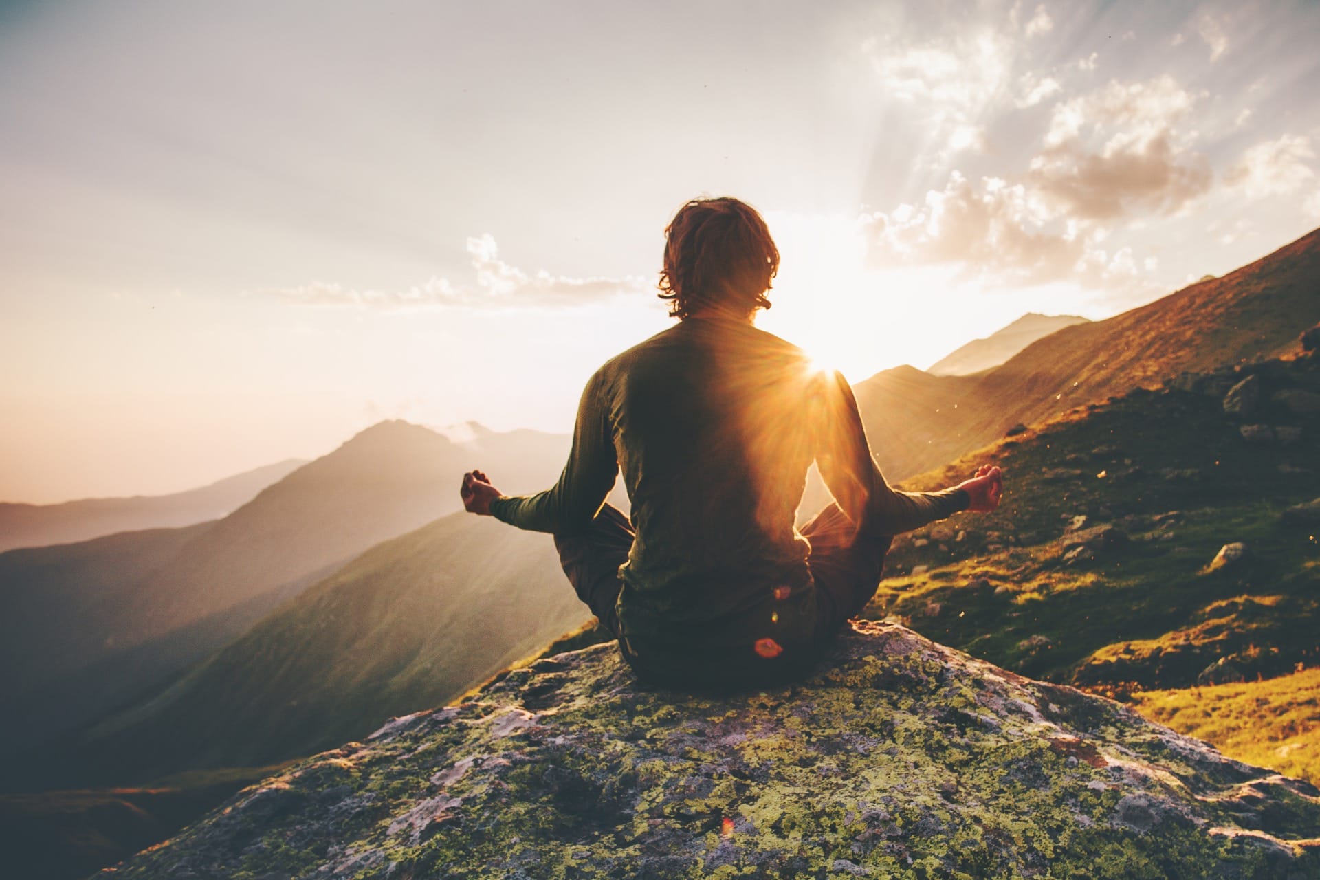 https://www.yourhealth.net.au/wp-content/uploads/2019/11/man-meditating-at-sunset-in-the-mountains.jpg